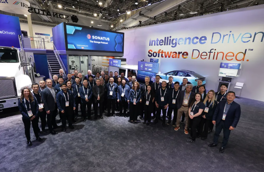 Sonatus’ booth at CES 2026, featuring their team for a group photo.